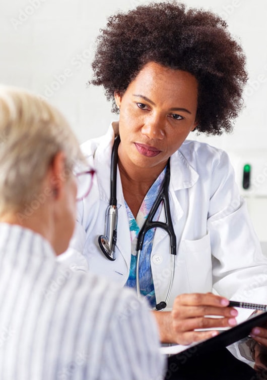 a doctor consults with a patient during a weight loss consultation
